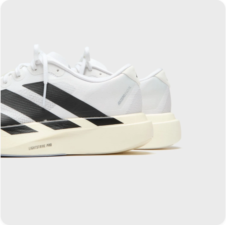 adidas Running-Style Sneakers – White, Black & Cream